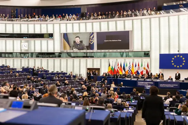 14 December 2022, France, Stra'burg: Ukrainian President Volodymyr Selenskyj speaks live to visitors and members of the European Parliament during the Sakharov Prize ceremony. The European Parliament will today award the Sakharov Prize to the Ukrainian people and vote on financial aid of nearly 720 million euros for seven EU countries - including Germany - hit by natural disasters in 2021. It will also hold a debate with the EU Commission and the Czech presidency to set goals for the EU summit the following day. Photo by: Philipp von Ditfurth/picture-alliance/dpa/AP Images