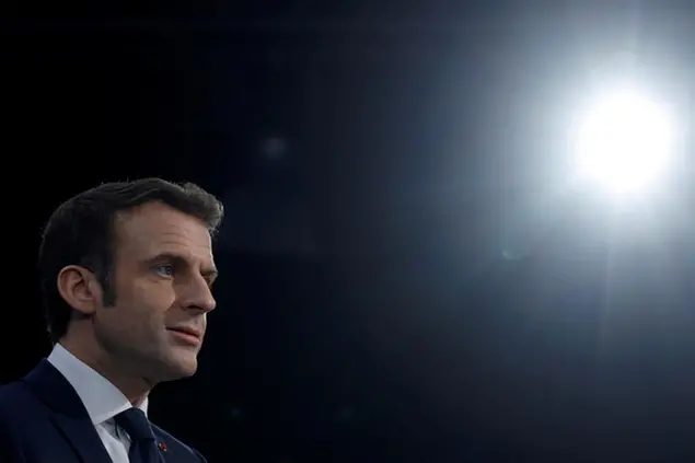 FILE - French President Emmanuel Macron attends an informal meeting of European space ministers, in Toulouse, southwestern France, Feb. 16, 2022. Macron has on Thursday, March 3, 2022 formally announced he will run for a second term in Aprilâ€™s presidential election. (Gonzalo Fuentes/Pool via AP, File)