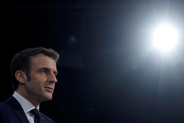 FILE - French President Emmanuel Macron attends an informal meeting of European space ministers, in Toulouse, southwestern France, Feb. 16, 2022. Macron has on Thursday, March 3, 2022 formally announced he will run for a second term in April\\u00E2\\u20AC\\u2122s presidential election. (Gonzalo Fuentes/Pool via AP, File)