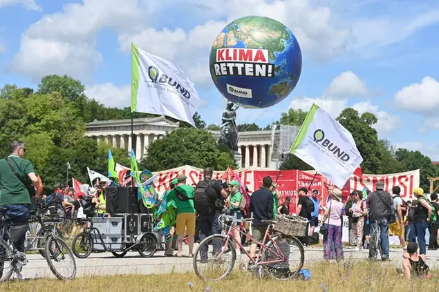 Activists with banners, banners, banners. save the climate. Large-scale demonstration in Munich before the G7 summit on June 25th, 2022 in Munich / Theresienwiese, Photo by: Frank Hoermann/SVEN SIMON/picture-alliance/dpa/AP Images