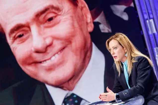 Foto Roberto Monaldo / LaPresse 18-01-2022 Roma Trasmissione tv “Porta a Porta” Nella foto Giorgia Meloni, sullo schermo Silvio Berlusconi Photo Roberto Monaldo / LaPresse 18-01-2022 Rome (Italy) Tv program “Porta a Porta” In the pic Giorgia Meloni