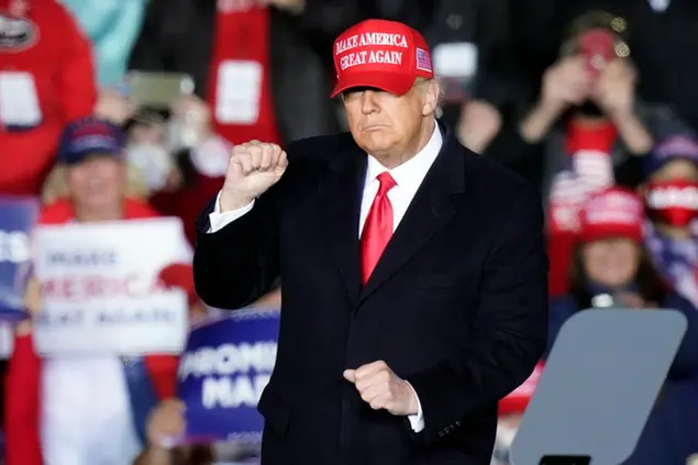 President Donald Trump dances after speaking at a campaign rally on Sunday, Nov. 1, 2020, at Richard B. Russell Airport in Rome, Ga. (AP Photo/Brynn Anderson)