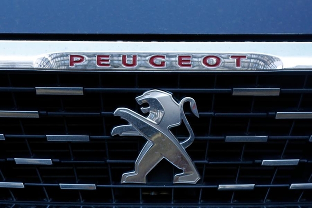 FILE - In this Wednesday, Dec.18, 2019 file photo, he logo of the French car maker Peugeot is pictured in Paris. Fiat Chrysler and PSA Peugeot on Wednesday, Oct. 28, 2020 confirmed progress toward their full merger to create the globe\\u2019s fourth-largest carmaker, with completion expected by the end of March 2021. (AP Photo/Thibault Camus, file)