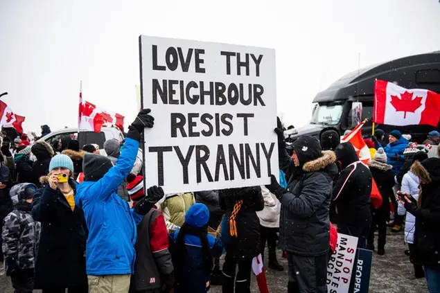 Protestors show their support for the Freedom Convoy of truck drivers who are making their way to Ottawa to protest against COVID-19 vaccine mandates by the Canadian government on Thursday, Jan. 27, 2022, in Vaughan. (Photo by Arthur Mola/Invision/AP)