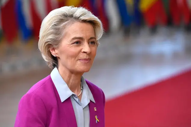 European Commission President Ursula von der Leyen speaks with the media as she arrives for an EU summit in Brussels, Thursday, Oct. 20, 2022. European Union leaders were heading into a two-day summit Thursday with opposing views on whether, and how, the bloc could impose a gas price cap to contain the energy crisis fueled by Russian President Vladimir Putin's invasion of Ukraine and his strategy to choke off gas supplies to the bloc at will. (AP Photo/Geert Vanden Wijngaert)