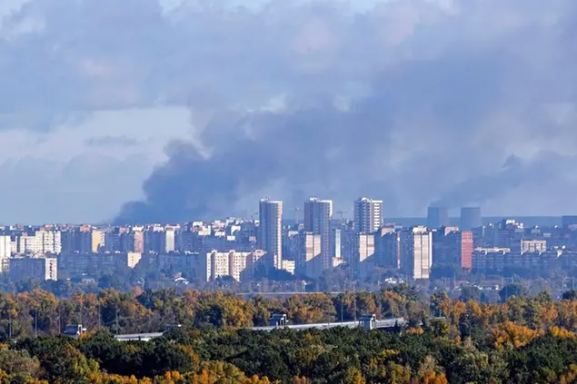 Black smoke rises over Ukraine's capital Kyiv on Oct. 10, 2022, following Russian missile attacks earlier in the day. (Kyodo via AP Images) ==Kyodo