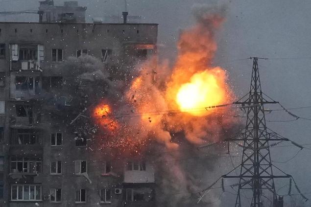 An explosion in an apartment building that came under fire from a Russian army tank in Mariupol, Ukraine, Friday, March 11, 2022. Ukraine\\u00E2\\u20AC\\u2122s military says Russian forces have captured the eastern outskirts of the besieged city of Mariupol. In a Facebook update Saturday, the military said the capture of Mariupol and Severodonetsk in the east were a priority for Russian forces. Mariupol has been under siege for over a week, with no electricity, gas or water. (AP Photo/Evgeniy Maloletka)