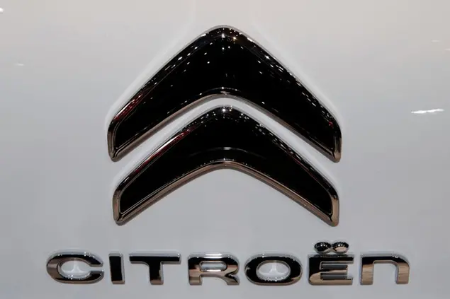 French car maker Citroen logo is pictured at the Auto show in Paris, France, Wednesday, Oct. 10, 2018, 2018. All-electric vehicles with zero local emissions are among the stars of the Paris auto show, rubbing shoulders with the fossil-fuel burning SUVs that many car buyers love. (AP Photo/Christophe Ena)