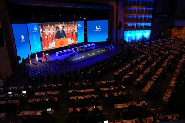 Turkey's President Recep Tayyip Erdogan addresses international police delegates during the first day of the Interpol annual assembly in Istanbul, Turkey, Tuesday, Nov. 23, 2021. Interpol kicked off its annual meeting in Istanbul on Tuesday, to discuss security threats and crime trends as well as to hold a closely-watched election for the international police body' new leadership. (AP Photo/Francisco Seco)