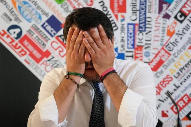 Italy\\\\\\\\\\\\'s League Party leader, Matteo Salvini, wipes his face prior to the start of a press conference at the Foreign Press club headquarters in Rome, Tuesday, June 7, 2022. (AP Photo/Gregorio Borgia)