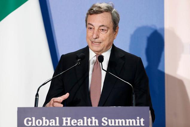 Italian Premier Mario Draghi speaks during a joint press conference with EU Commission President Ursula von Der Leyen at the end of a virtual Global Health Summit, in Rome's Villa Pamphili, Friday, May 21, 2021. Leaders of the most industrialized countries met virtually for the summit and pledged to step up the production and distribution of anti-Covid vaccines. (Remo Casilli/Pool Photo via AP)